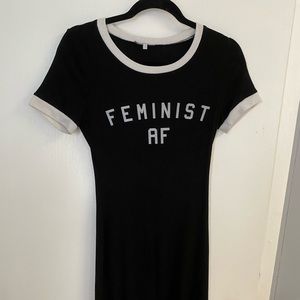 Black Jersey dress. "Feminist AF"